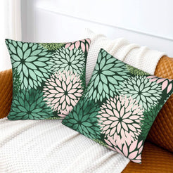Dark green, mint and blush dahlia pattern velvet pillow covers styled on a sofa