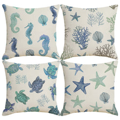 Set of four water-resistant linen-look polyester pillow covers with blue and green seahorse, coral and turtle prints