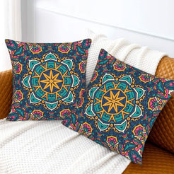 Teal and gold star mandala design velvet pillow covers styled on a sofa