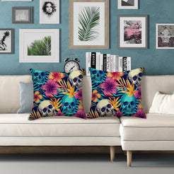 Water-resistant pillow covers with multicolor skulls, palm leaves and flowers, styled on a white sofa