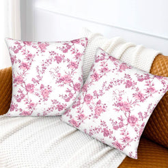 Pink toile velvet pillow covers with pink small floral sprays on white, styled on a sofa