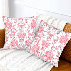 Pink toile velvet pillow covers with pink dense vintage florals on white, styled on a sofa