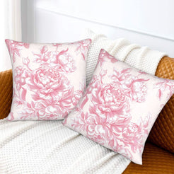 Pink toile velvet pillow covers with pink large roses on white, styled on a sofa
