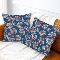 Bohemian floral velvet pillow covers with navy palm trees, styled on a sofa