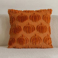quilted polyester pillow cover with raised rust pumpkin rows, shown on a cream sofa