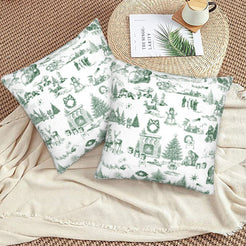 Green on white classic Christmas town toile velvet pillow covers styled on a floor cushion