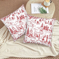 Red on white winter holiday toile velvet pillow covers styled on a floor cushion