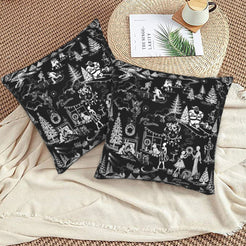 White on black winter holiday toile velvet pillow covers styled on a floor cushion