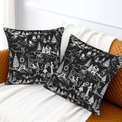 White on black winter holiday toile velvet pillow covers styled on a bed