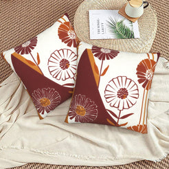 Fall velvet pillow covers with cream burgundy blocks and line-art flowers, styled on a beige sofa