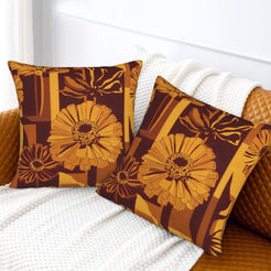 Fall velvet pillow covers with burgundy line-art flowers and gift-box shapes, styled on a white sofa