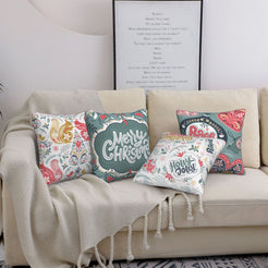 Short-pile plush pillow covers with pastel Nordic Christmas folk motifs, styled on a cream sofa