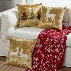 Gold embroidered Christmas tree pillow covers styled with holiday decor