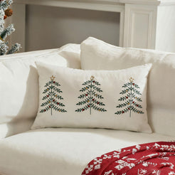 Ivory embroidered Christmas tree velvet lumbar pillow cover styled on a white sofa