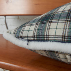 Close-up of ivory and navy tartan woven cotton-polyester blend with white trim