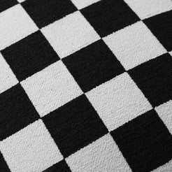 Close-up of black and white checkerboard chenille texture