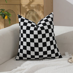 Black and white checkerboard chenille square pillow cover on a sofa
