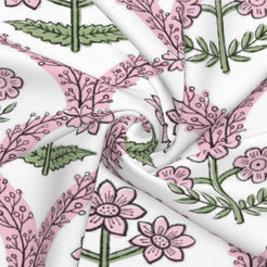 Close-up of water-resistant linen-look polyester with pink and green block-print-style florals