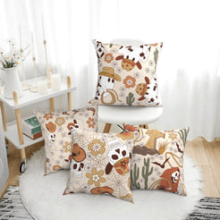 short-pile plush polyester pillow covers with cowboy ghosts, skeletons and cactus prints, arranged beside a white chair