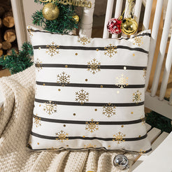 short-pile plush polyester pillow cover with black stripes and gold snowflakes, shown beside a Christmas tree
