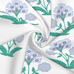 Fabric close-up of long lumbar pillow cover with lavender-blue small floral sprigs