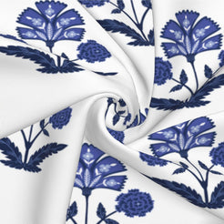 Fabric close-up of long lumbar pillow cover with navy block-print-inspired floral sprigs