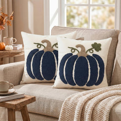 Tufted polyester pillow covers with a filled navy pumpkin, styled on a cream sofa