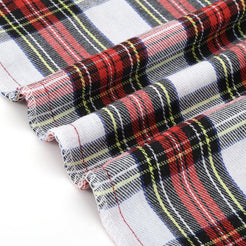 White, red and green tartan woven polyester-cotton blend pillow covers, woven fabric edge close-up