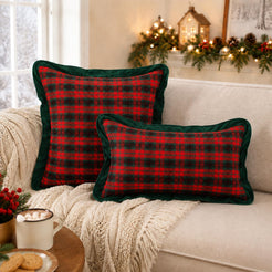 Square and lumbar polyester-cotton pillow covers with black and red tartan with dark green ruffle, styled on a sofa