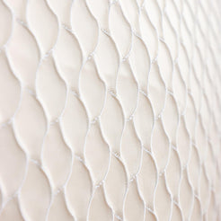 Raised wave jacquard texture close-up in white and silver